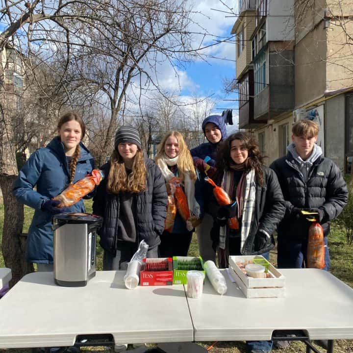 Giving out bread and tea on the streets